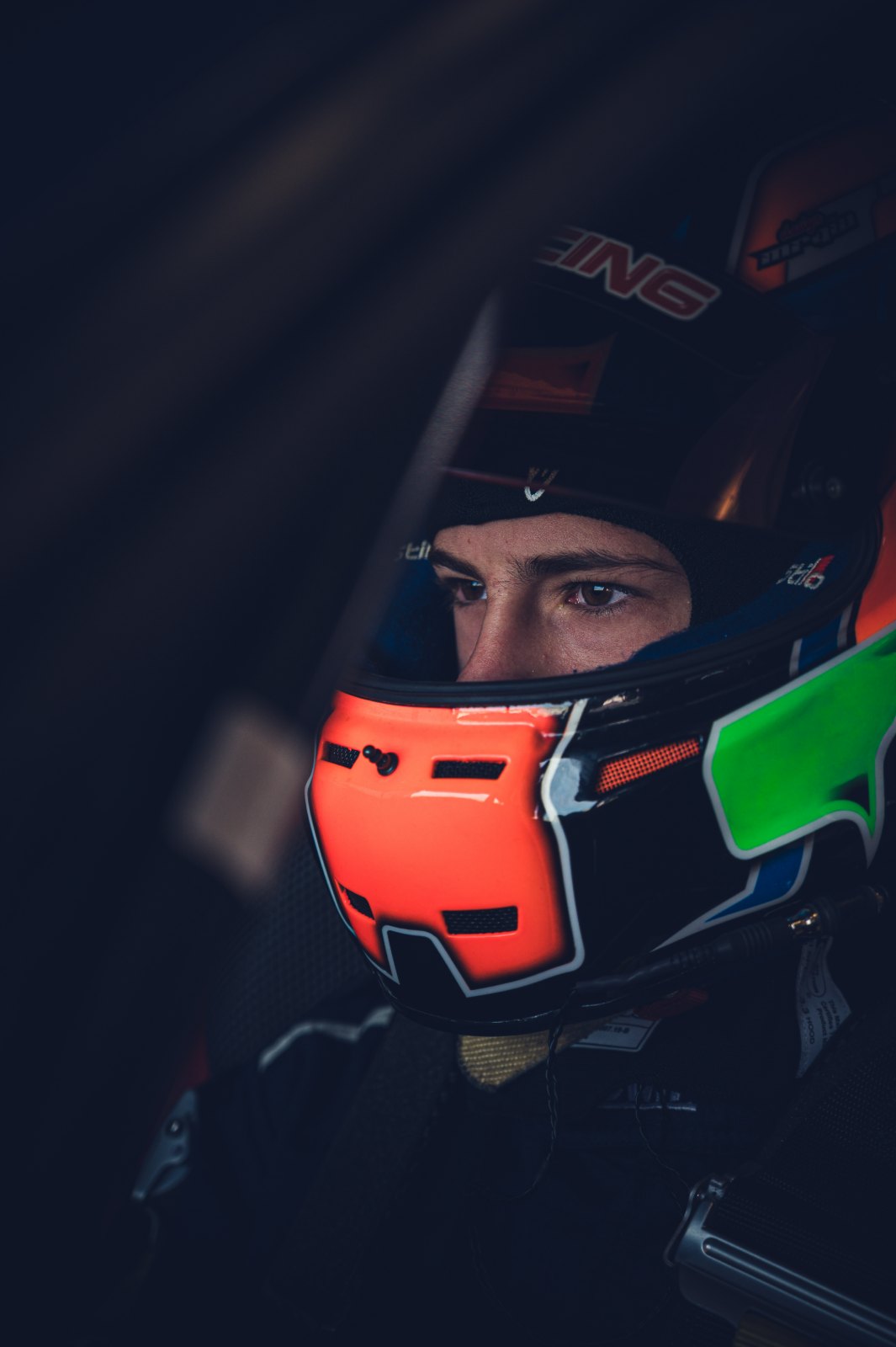 Ethan Dvir, helmet on in the car